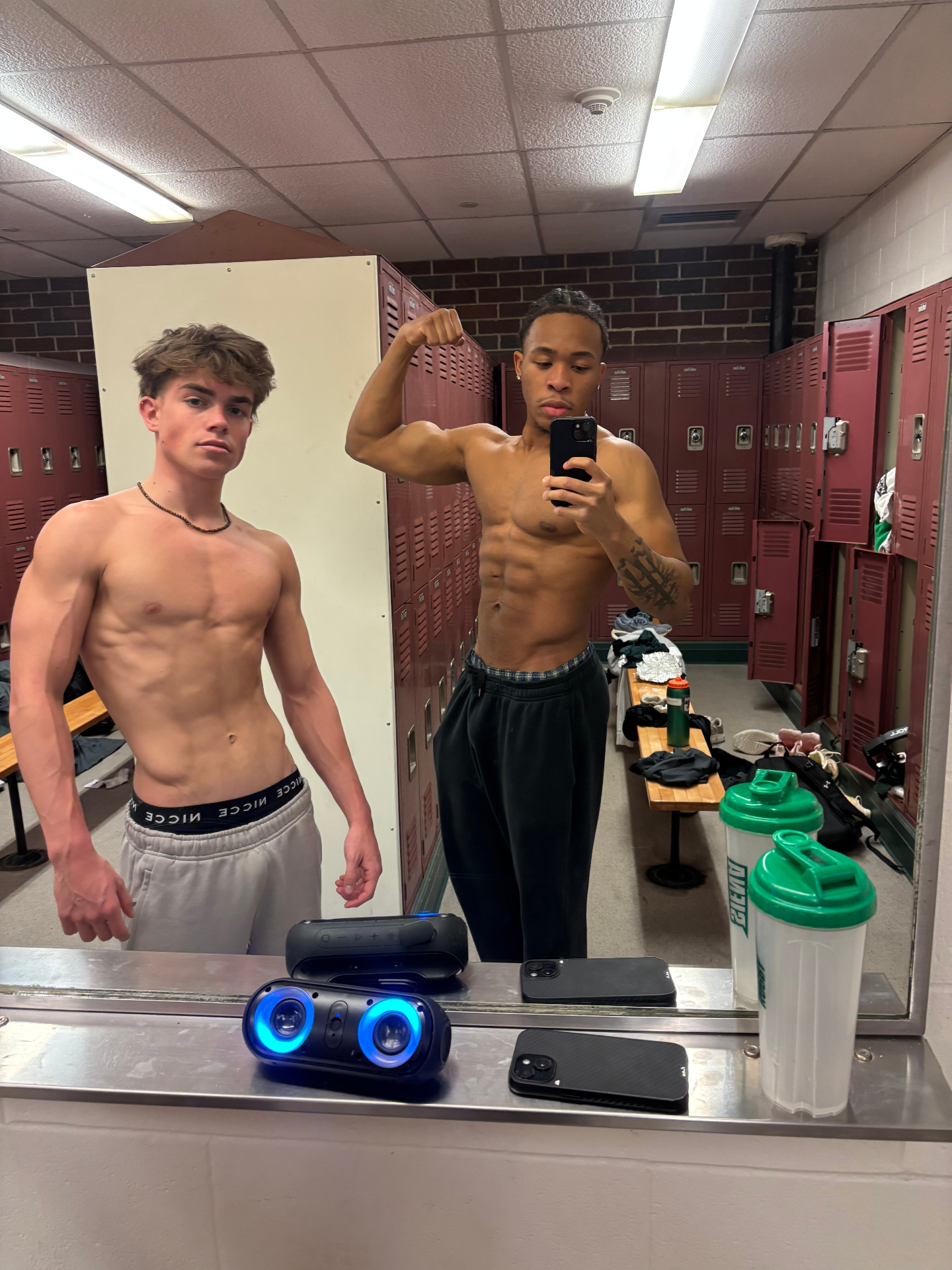 Mid-block check-in. Coach on the right, Henry on the left — receipts in the mirror.